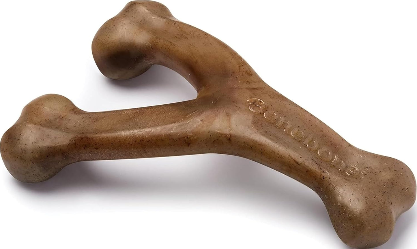 A brown rubber bone-shaped dog toy with a split design, photographed on a clean white background.