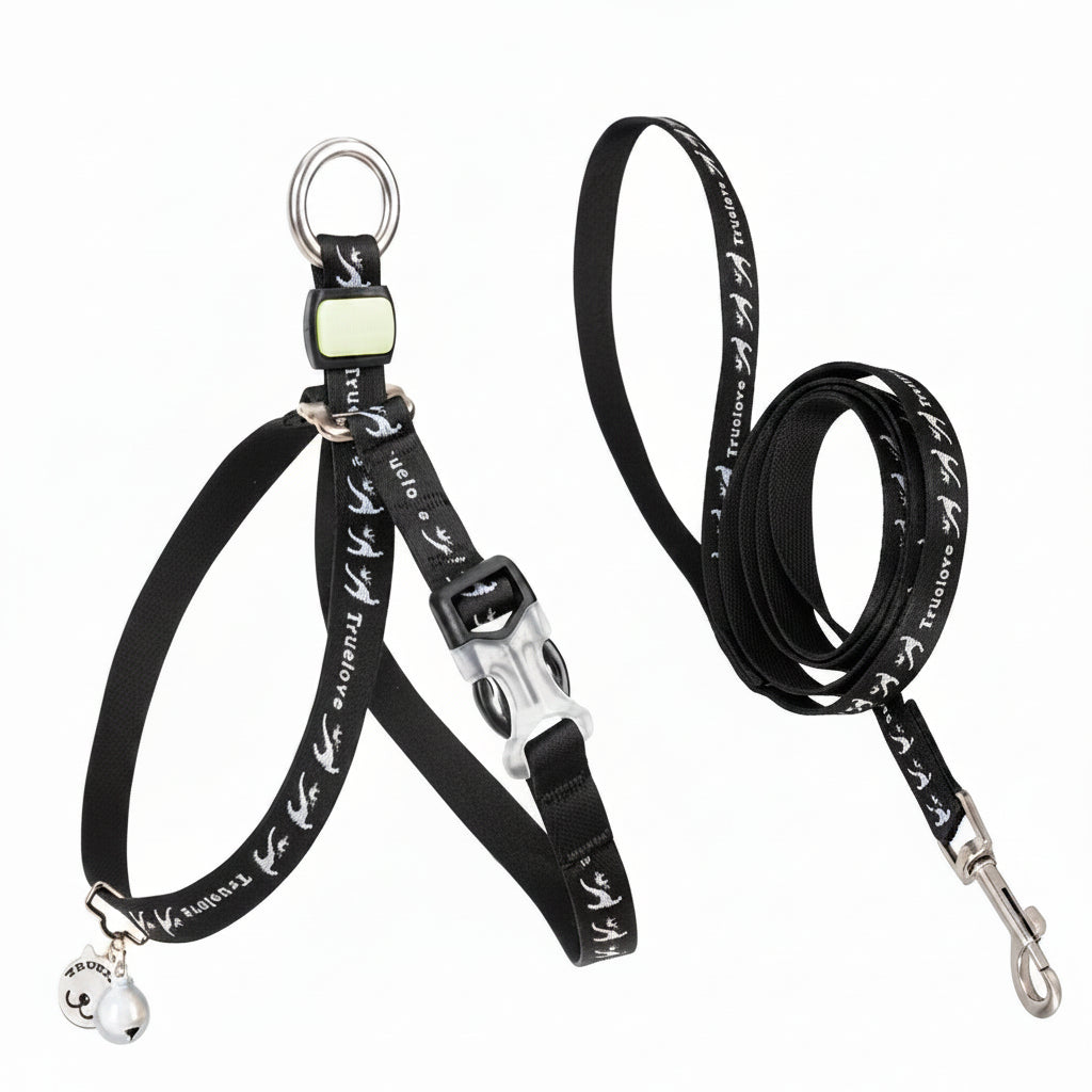 Black dog leash with white patterns and metal clip on a white background